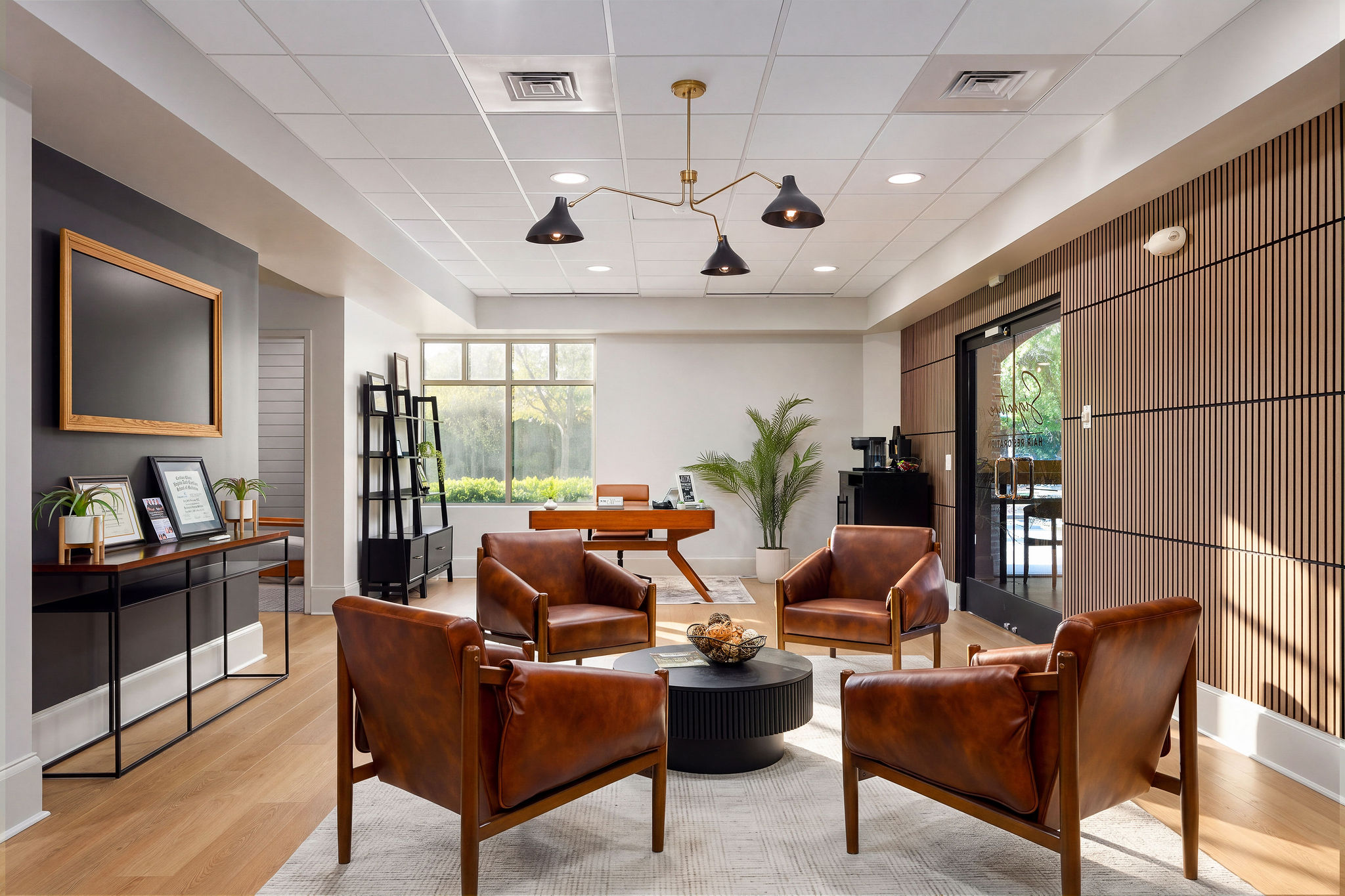 High Point clinic reception lounge with leather seating and refreshments