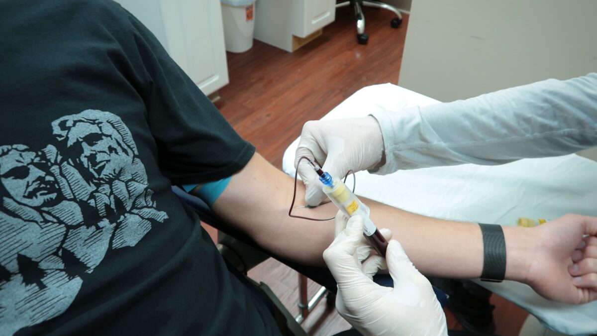 Blood Draw during PRP hair treatment at Signature Hair Restoration
